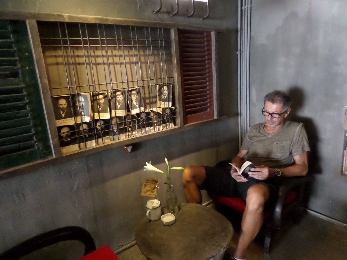 Nick reading up on Lenin (in Vietnamese) at Cong Cafe